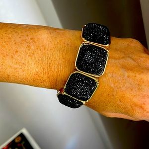 Pretty bracelet! A little stretched out and some imperfections on the gold.